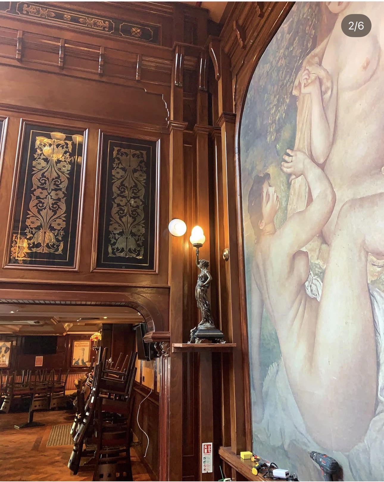 Ornate wood-panelled interior of Quinn's Bar, Newcastle — the venue Wi-Fi survey was carried out in
