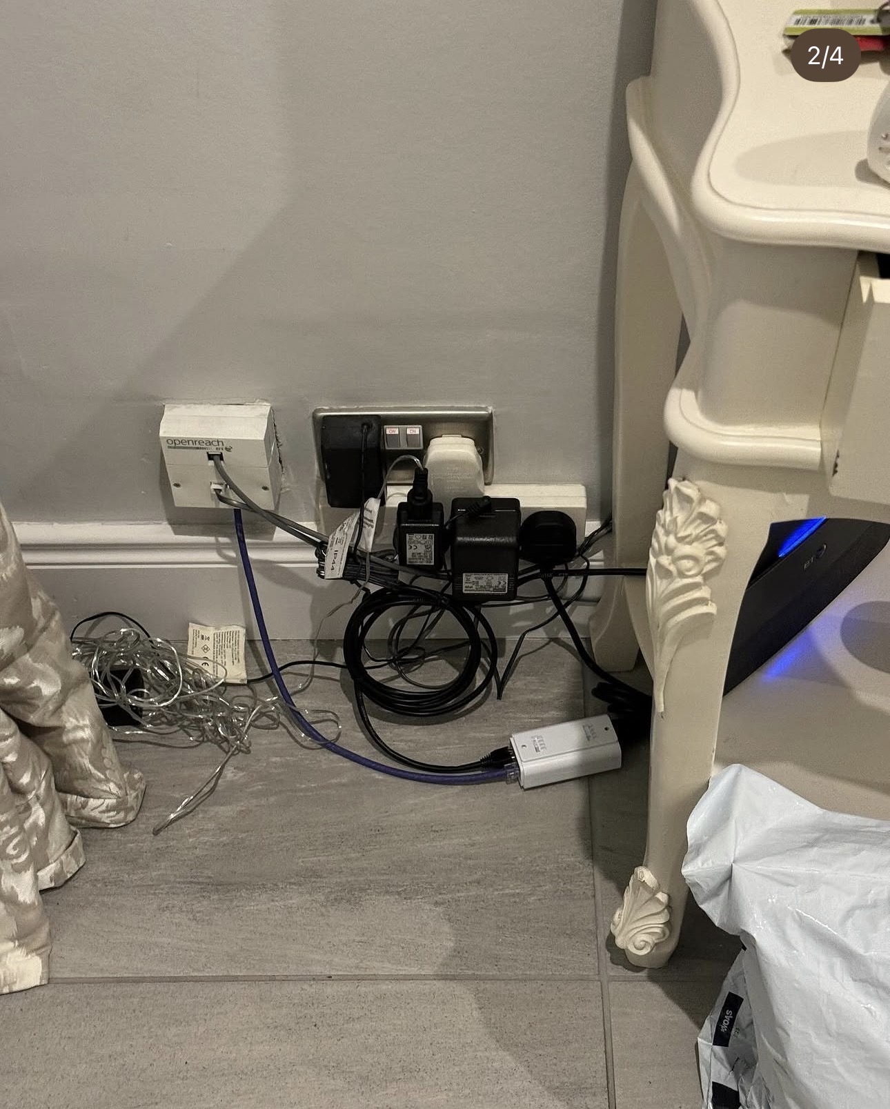Existing Openreach master socket and BT router the new access point was wired back to, replacing an unreliable home-plug setup