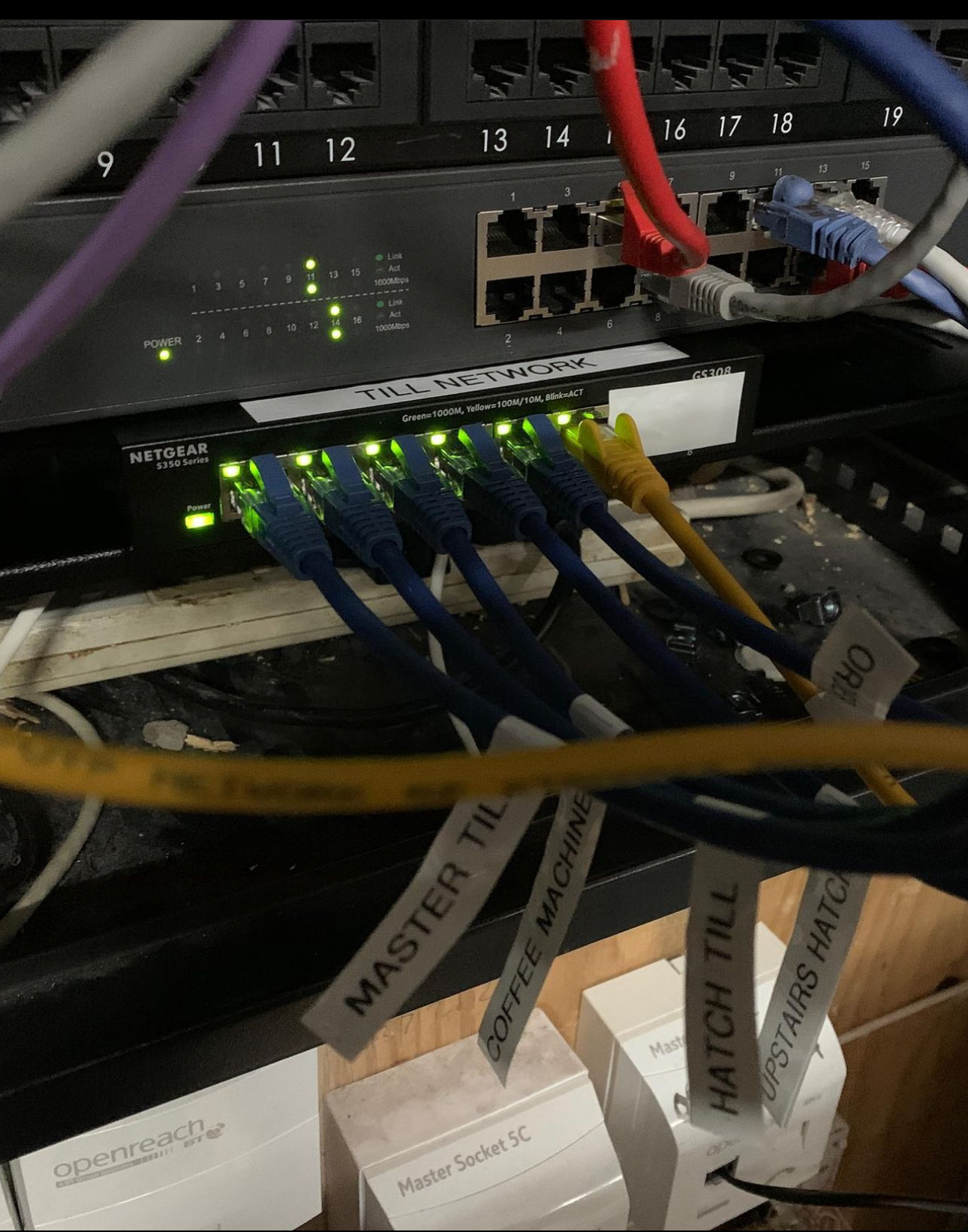 Comms cabinet with terminated patch panel installed by JKL Electrix
